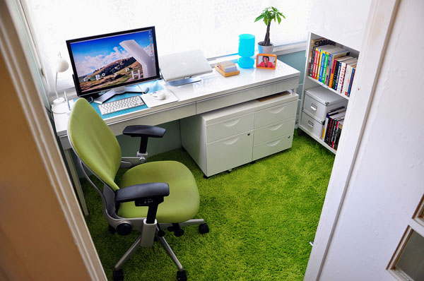 Escritório com tapete verde 